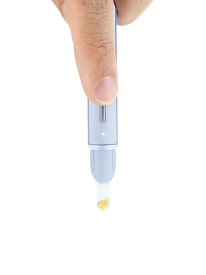 Puffco Hot Knife pearl in use dropping concentrate cleanly from heated tip