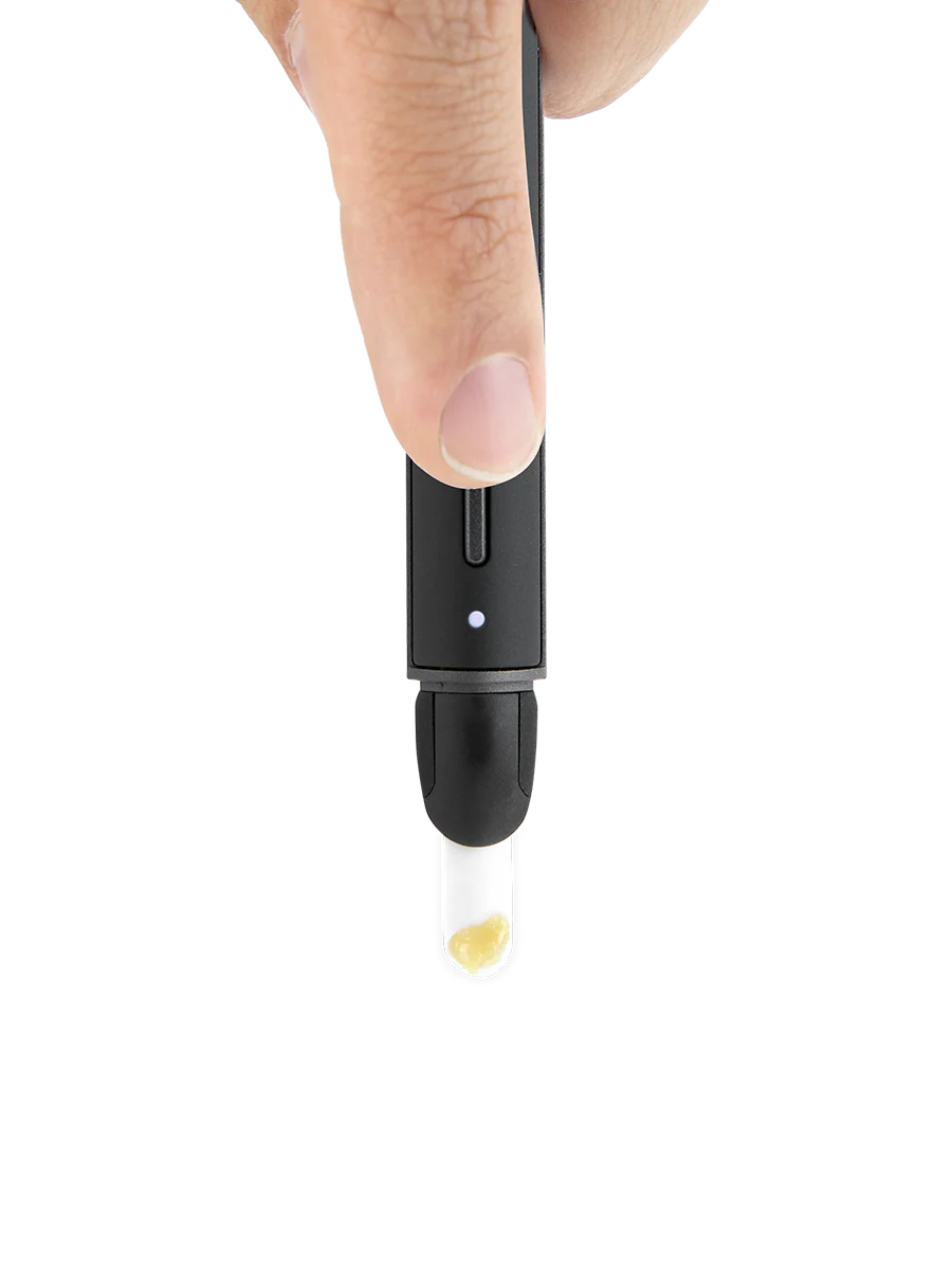 Puffco Hot Knife in use releasing concentrate from heated ceramic tip for clean loading