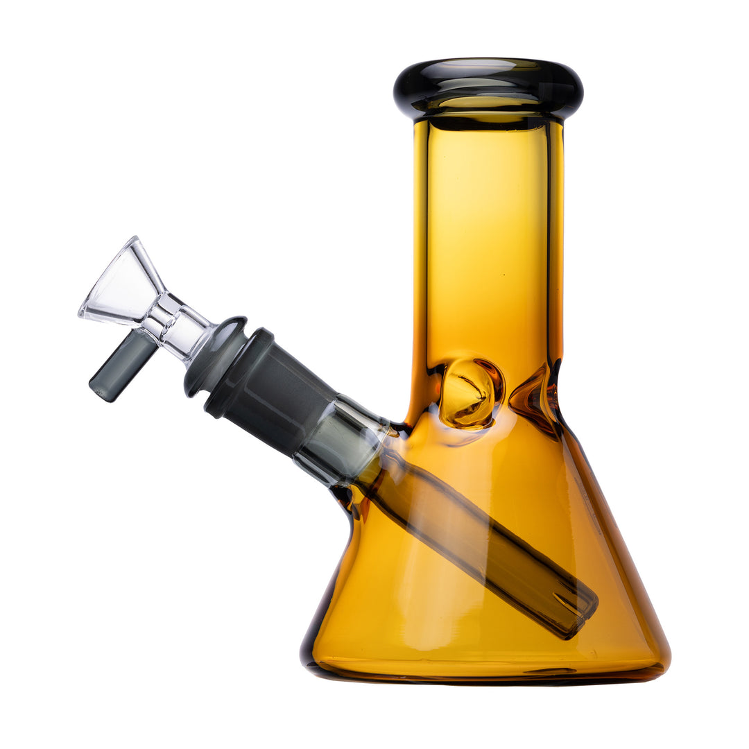 Human Grade 6" Beaker Water Pipe in the Yellow and Smoke colourway, amber body with a smoke grey lip wrap, downstem and bowl