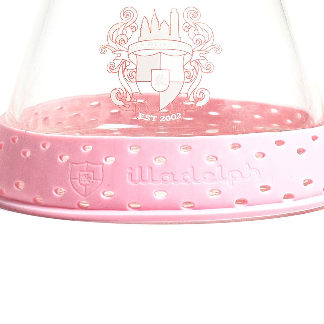 pink illadelph silicone base bumper fitted onto an illadelph mini beaker showcasing improved shock absorption and secure tabletop placement