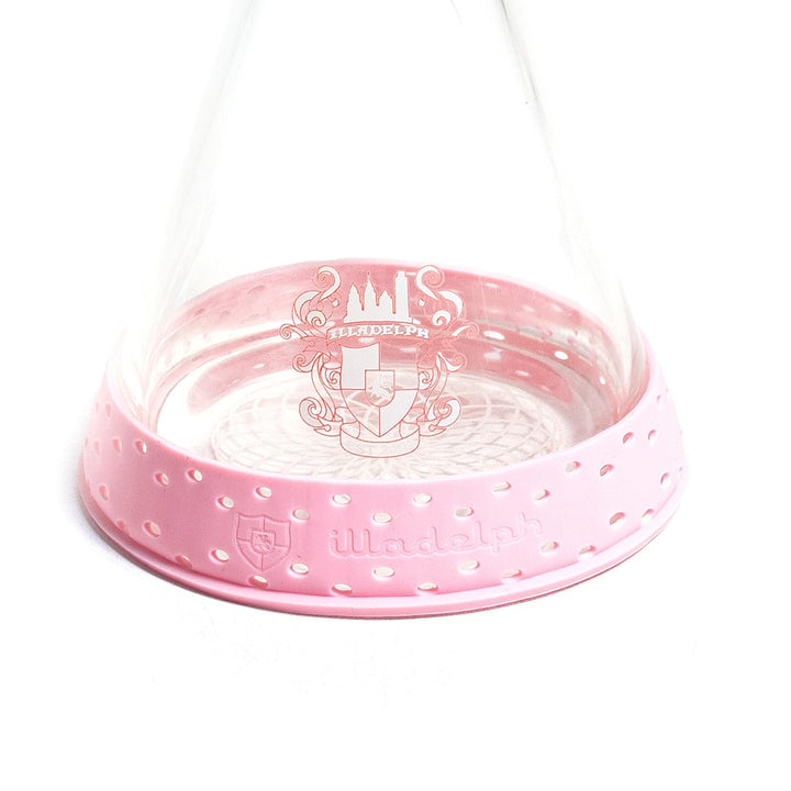 Illadelph Mini Base Bumper in Pink silicone, angled front view emphasizing the flexible high-density silicone engineered for Illadelph mini beakers