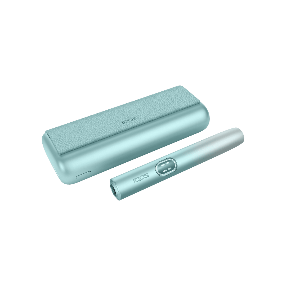 IQOS ILUMA i PRIME Breeze Blue closed pocket charger lying flat with the holder beside it