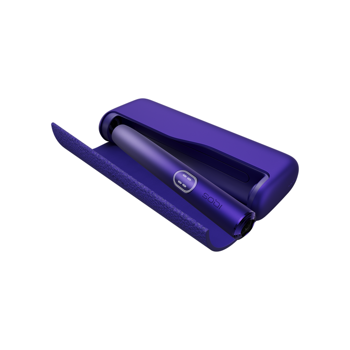 IQOS ILUMA i PRIME Electric Purple pocket charger with the wraparound cover open and the holder docked inside