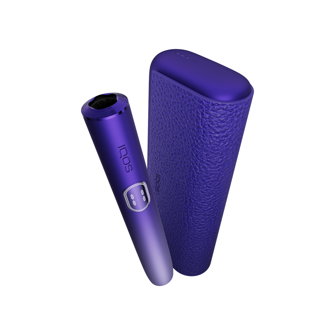 IQOS ILUMA i PRIME Electric Purple holder tilted in front of the closed textured pocket charger