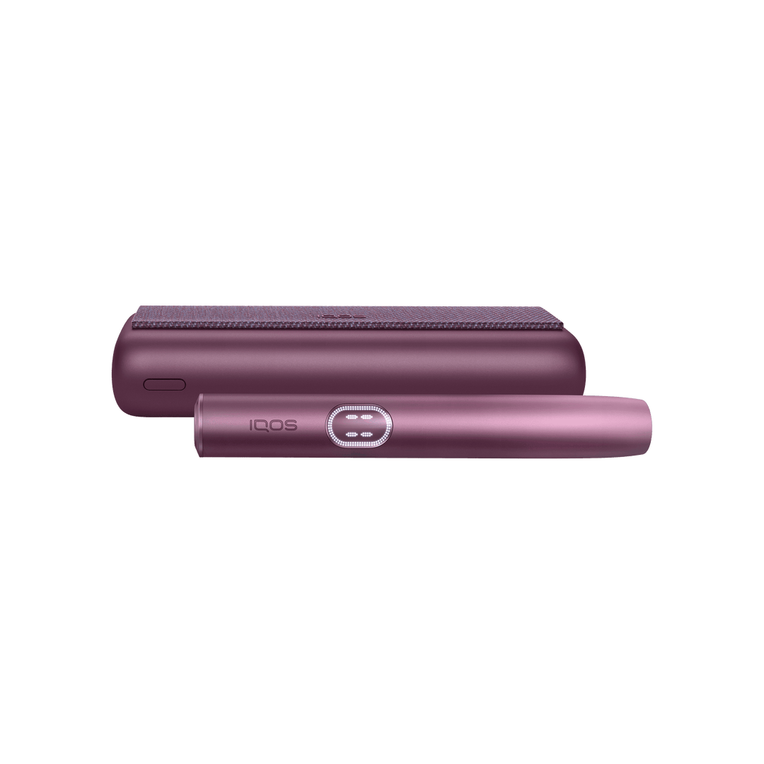 IQOS ILUMA i PRIME Garnet Red pocket charger and holder in side profile