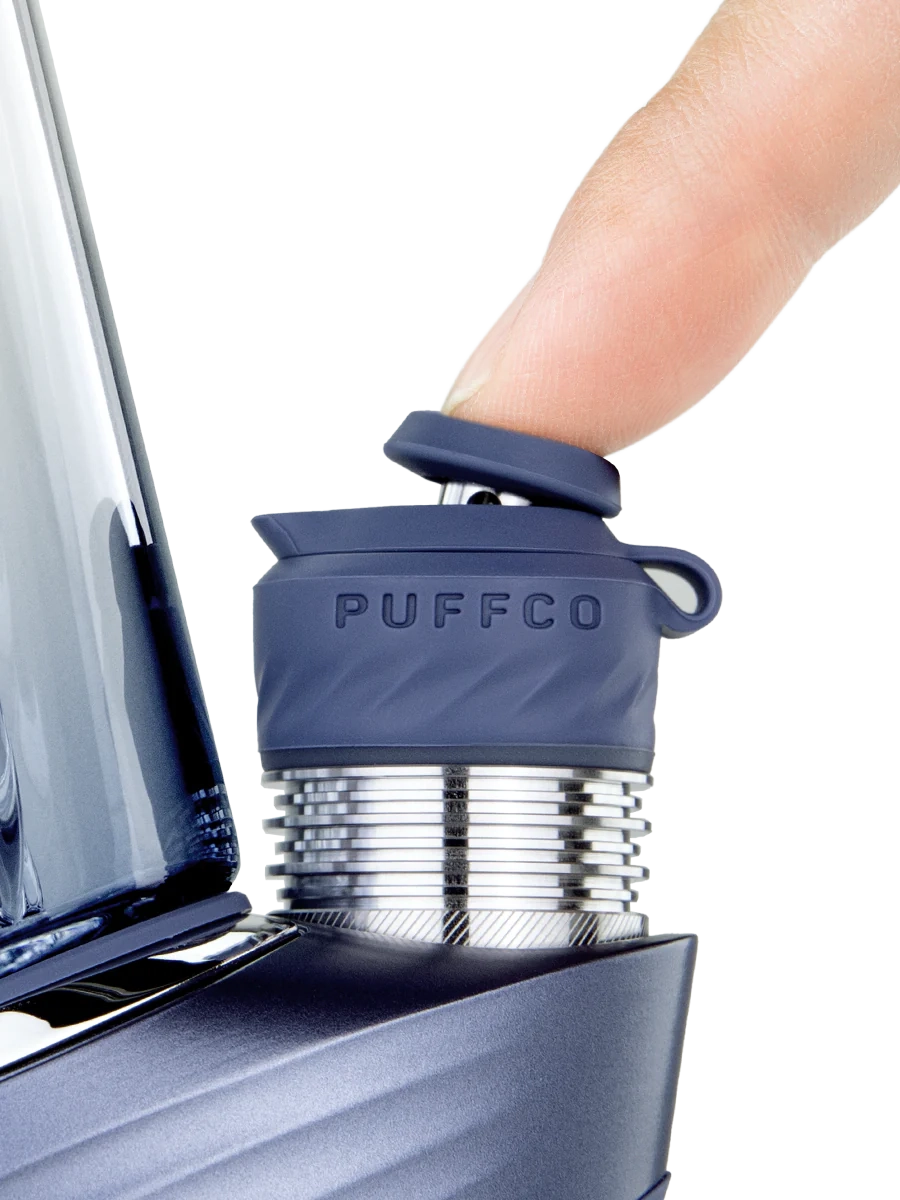 Puffco Peak Pro Storm 3DXL – hand interacting with joystick cap, showing grip and control placement.