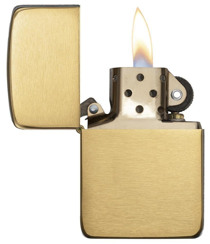Zippo - 1941 Replica Brushed Brass Lighter with windproof flame and brushed brass finish. Durable refillable gas lighter for everyday use.