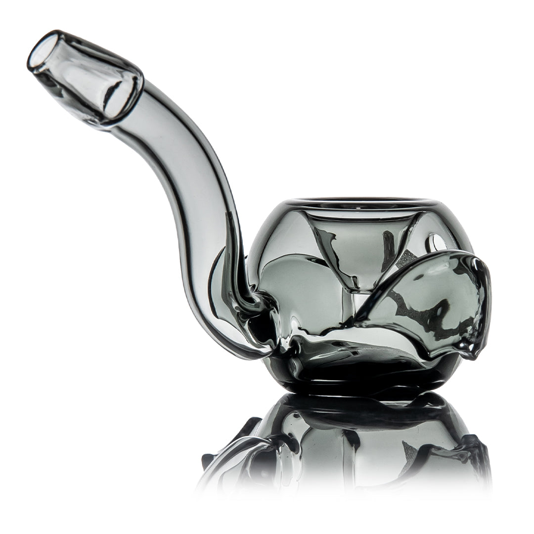 MJ Arsenal Bud-Sucker Hand Pipe from the mouthpiece side, the upswept smoke glass stem curving over the body