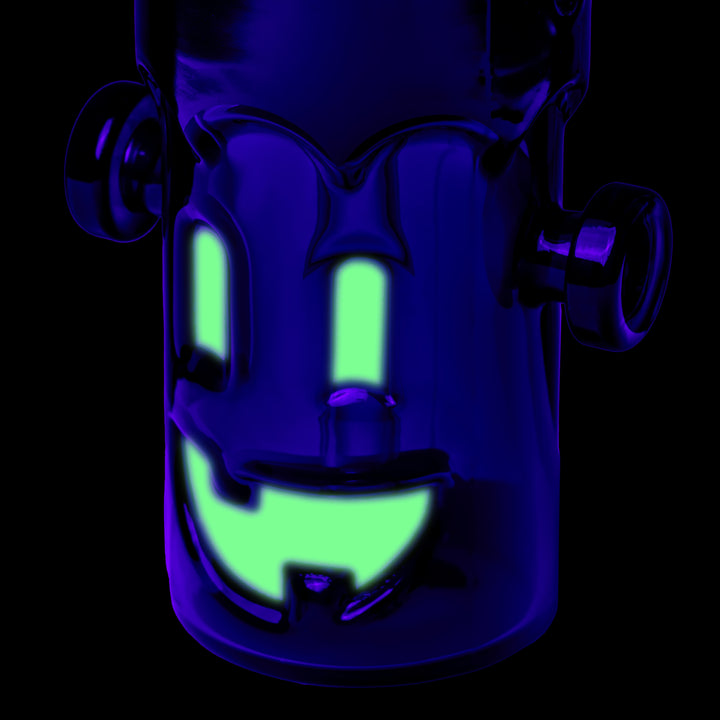 Close-up of the MJ Arsenal Frankenbubbler glowing monster face under black light