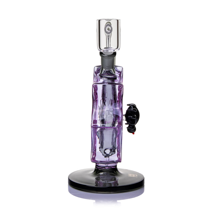 MJ Arsenal Nightcrawler Mini Dab Rig side view, showing how thin the purple spiderweb body is edge-on, the black spider standing proud of the web face, and the quartz banger seated on top