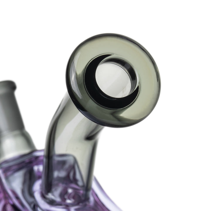 Close-up of the MJ Arsenal Nightcrawler Mini Dab Rig smoke-colored mouthpiece opening