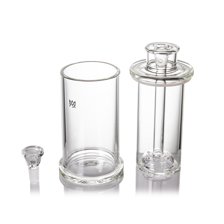 MJ Arsenal Piston Gravity Bong disassembled into shell, core, 14mm slide and silicone gasket.
