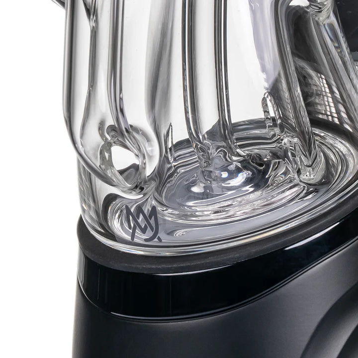 MJ Arsenal Tempest Peak attachment base connection showing fitment on Puffco Peak device