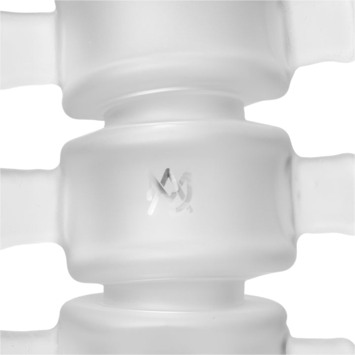Close-up of a frosted vertebra on the MJ Arsenal Skele-Tube Bong carrying the MJ Arsenal logo