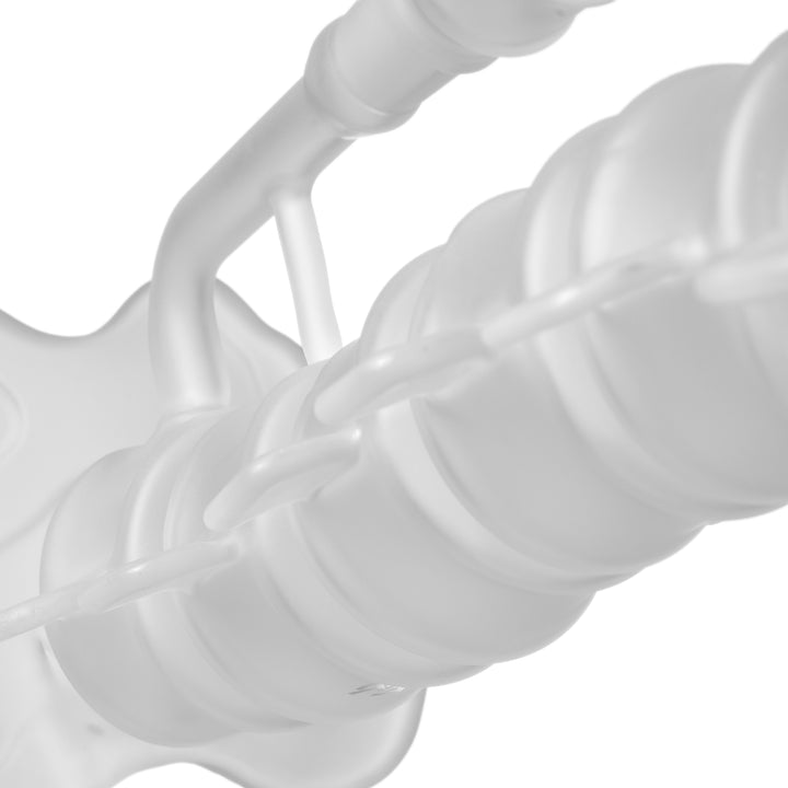 Close-up along the curved frosted spine of the MJ Arsenal Skele-Tube Bong, with the side arm running alongside