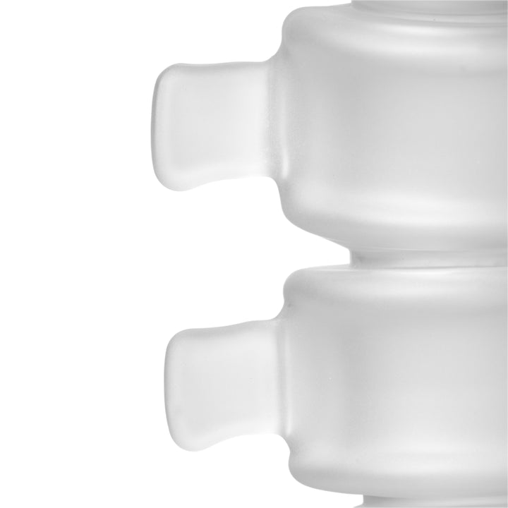 Close-up of the bone processes projecting from two frosted vertebrae on the MJ Arsenal Skele-Tube Bong