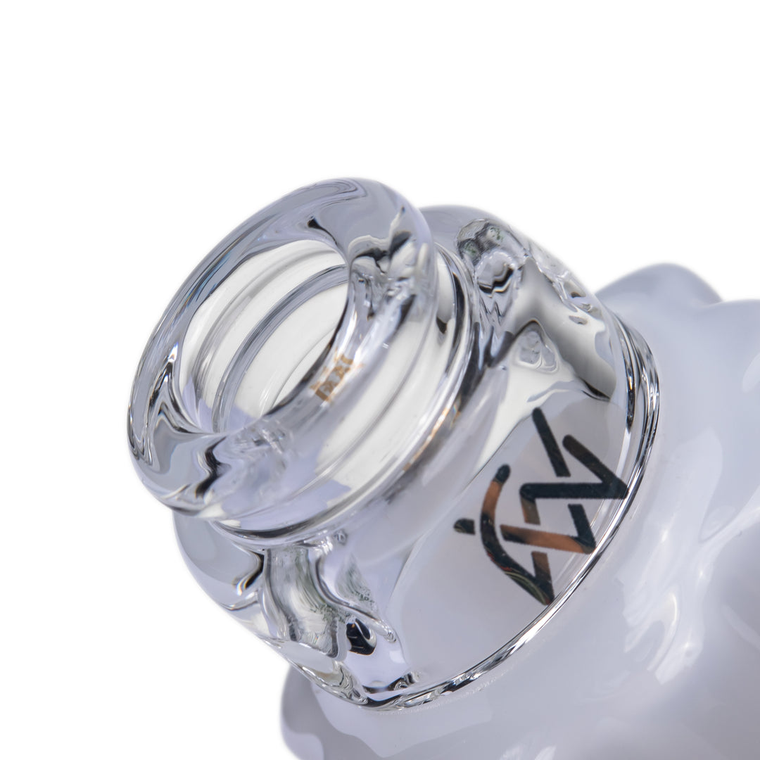 Close-up of the MJ Arsenal Specter Pivot Top clear glass base with the MJ Arsenal logo