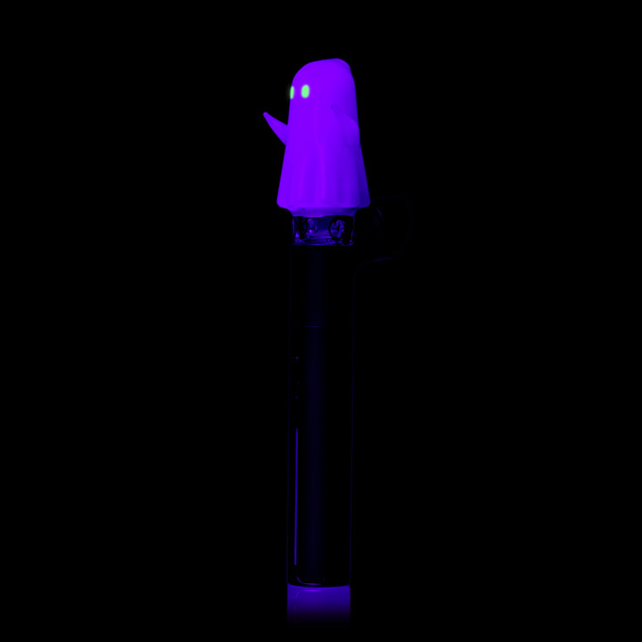 MJ Arsenal Specter Pivot Top glowing under black light, fitted on a Puffco Pivot, side view