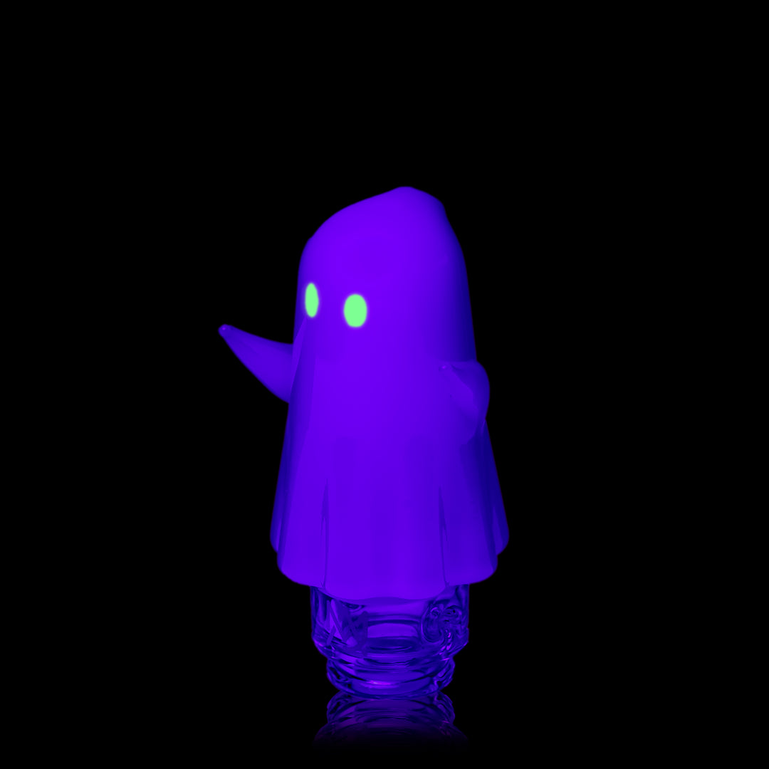 MJ Arsenal Specter Pivot Top under black light, three-quarter view