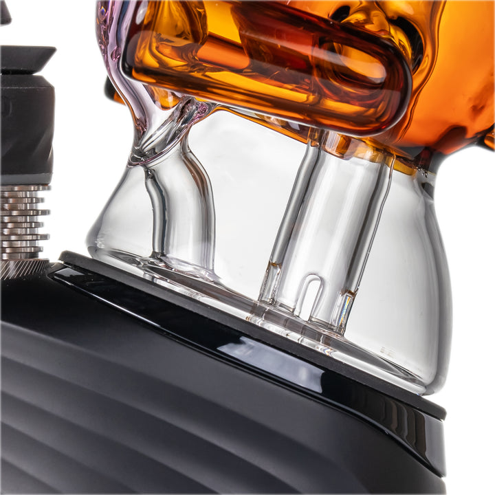 Close-up MJ Arsenal Teddy Peak Top base connection on Puffco Peak unit glass joint and water chamber detail