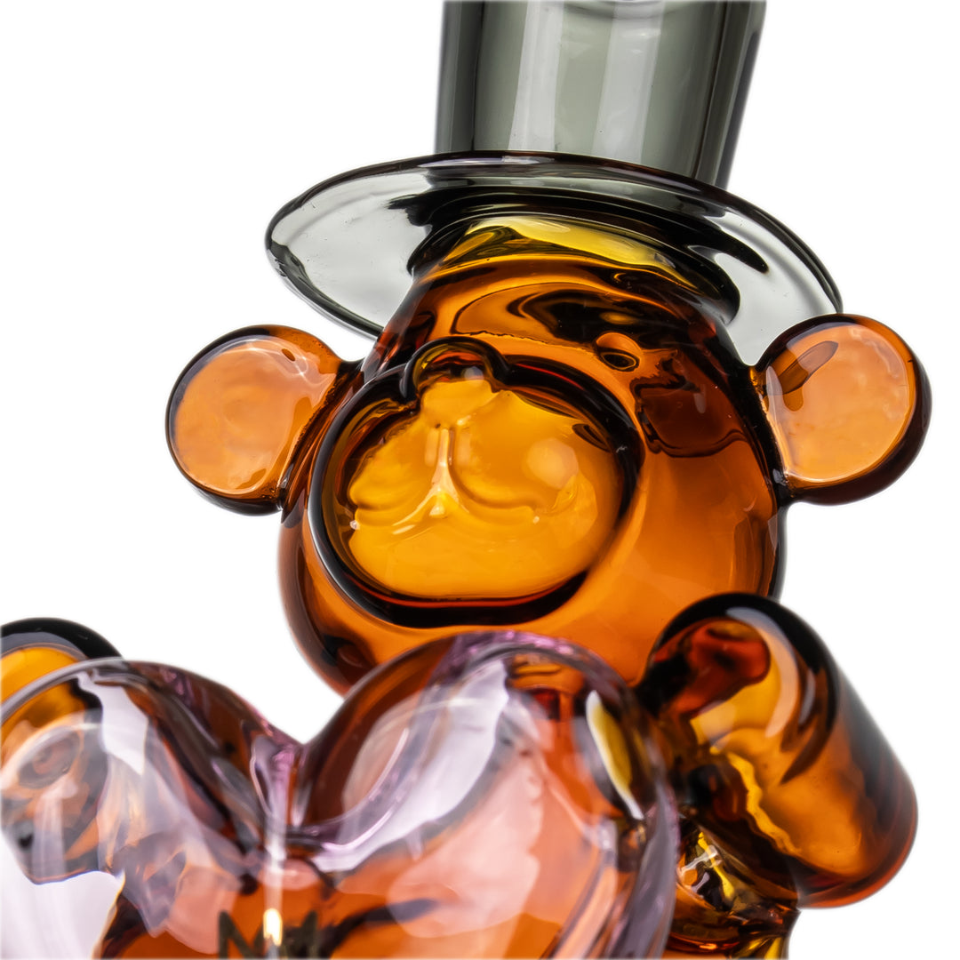 Close-up MJ Arsenal Teddy Peak Top teddy bear face and heart perc detail Puffco Peak glass attachment