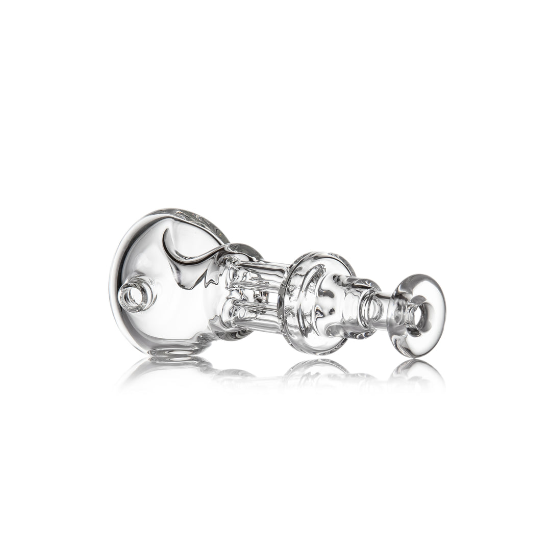 MJ Arsenal Tetra Hand Pipe laying flat — angled left side view of the pillar body