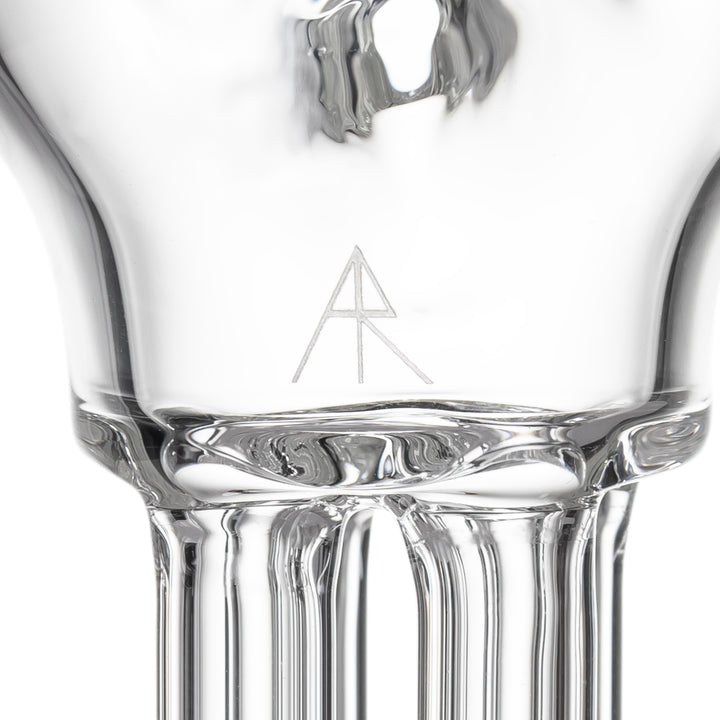 MJ Arsenal Tetra Hand Pipe — close-up of the MJ Arsenal logo confirming authentic branded glass