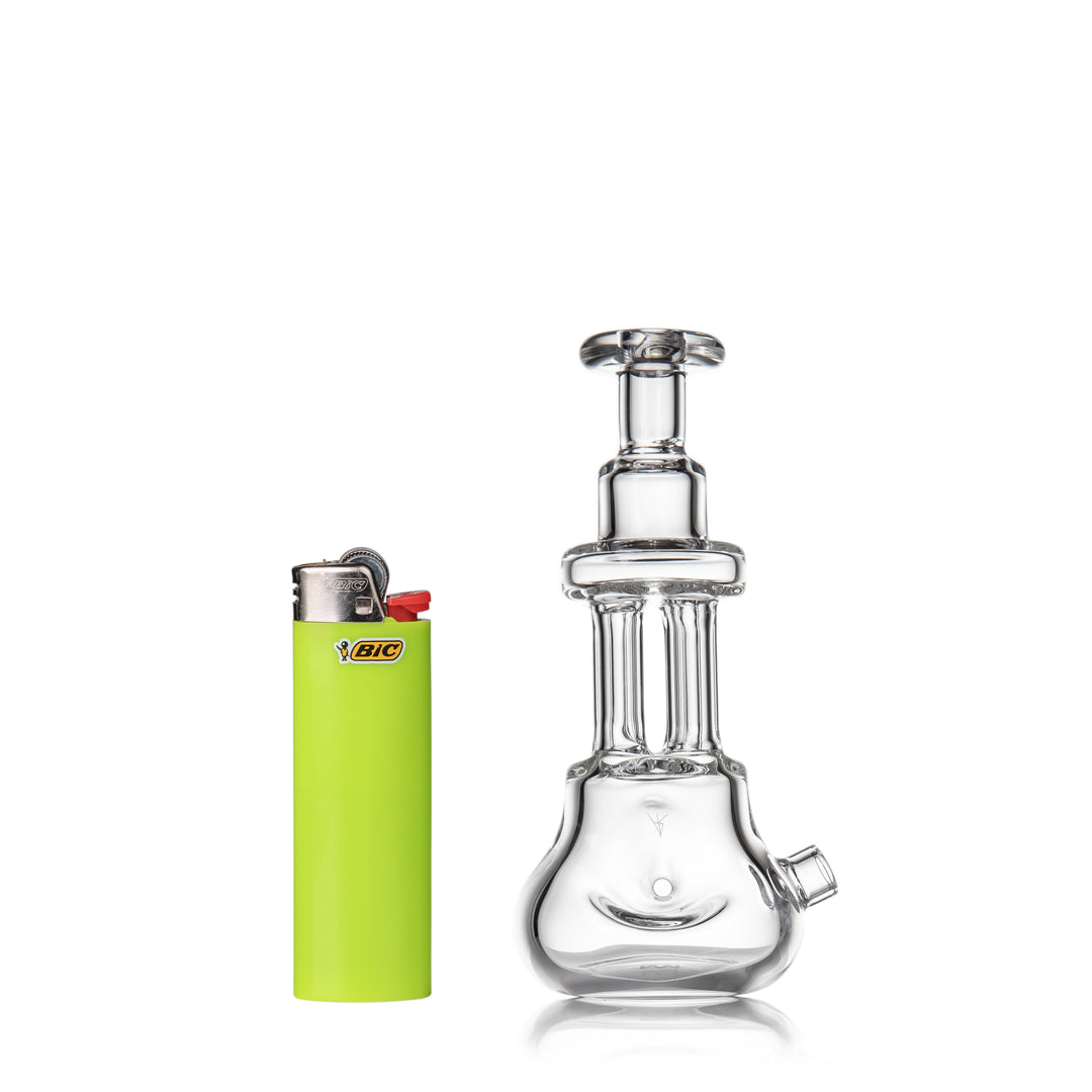 MJ Arsenal Tetra Hand Pipe shown next to a Bic lighter for scale — 4.5-inch hand pipe