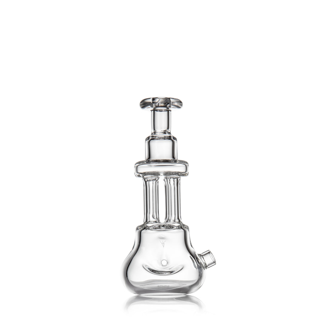 MJ Arsenal Tetra Hand Pipe standing upright on its base — the pipe rests vertically instead of rolling