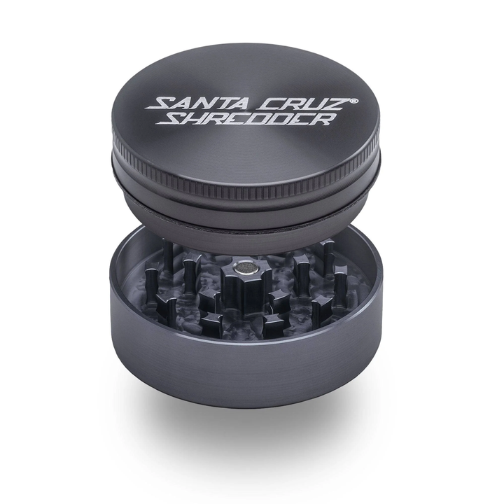 Grey Santa Cruz Shredder 2-Piece Medium Grinder – open view showing precision-milled teeth and matte metal finish.
