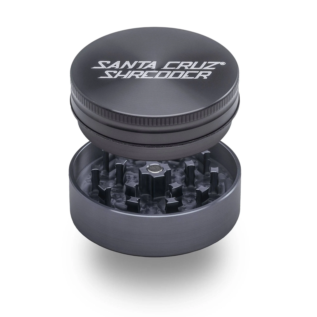 Grey Santa Cruz Shredder 2-Piece Medium Grinder – open view showing precision-milled teeth and matte metal finish.
