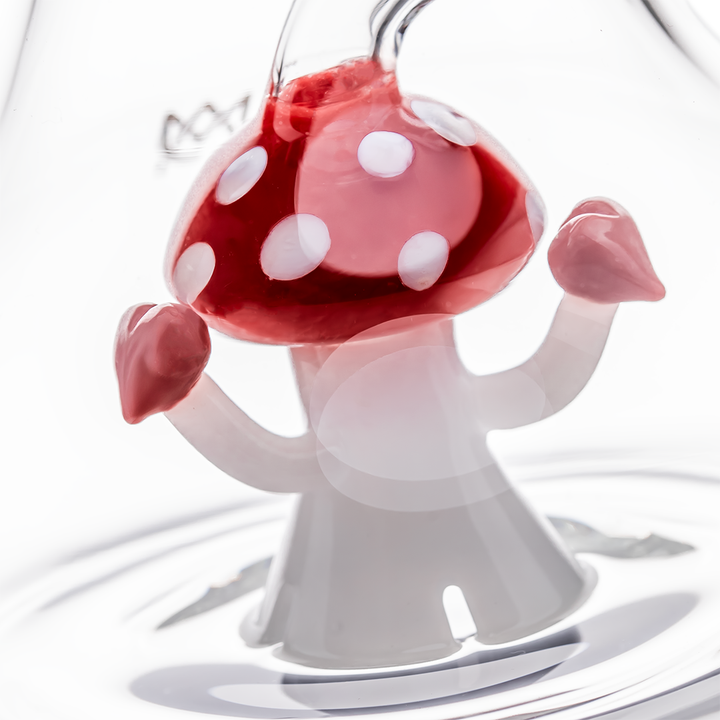Macro shot of the lower mushroom percolator in MJ Arsenal - Lovecap Water Pipe with red cap and pink heart-shaped hands for playful detail.
