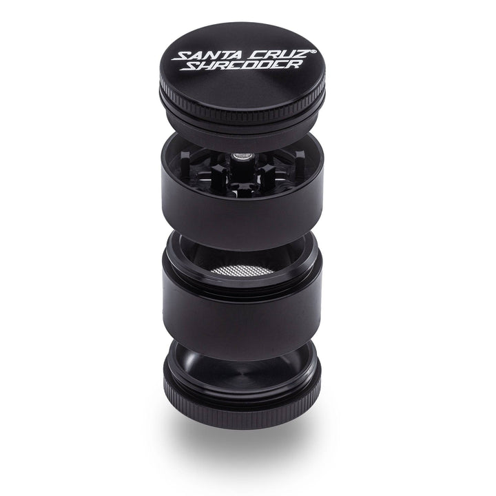 Black Santa Cruz Shredder 4-Piece Small Grinder – magnetic lid and razor-sharp teeth exposed.