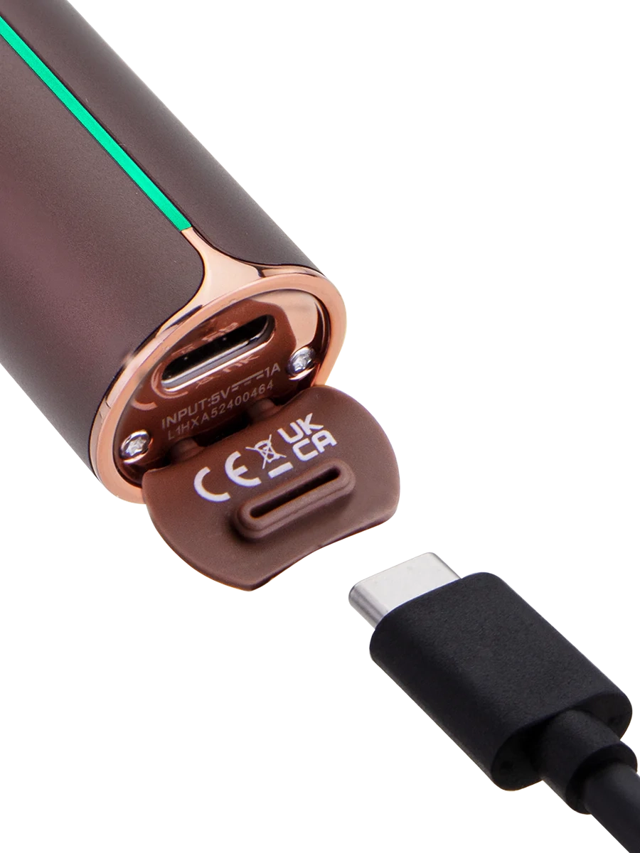 Puffco Pivot Mocha on charging dock with USB-C cable – magnetic charging system and LED base shown.