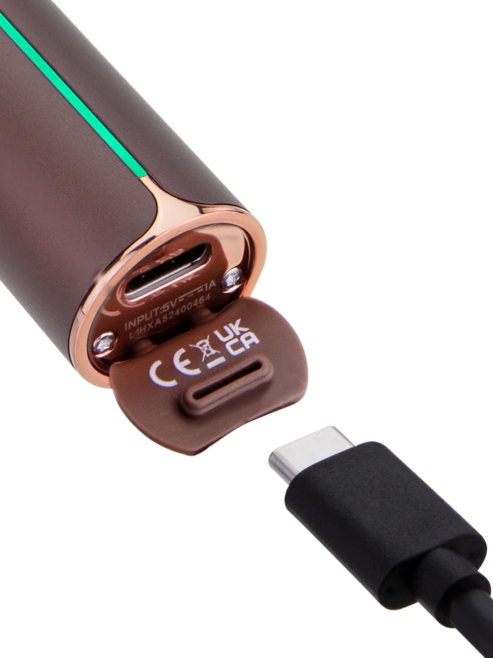 Puffco Pivot Mocha on charging dock with USB-C cable – magnetic charging system and LED base shown.