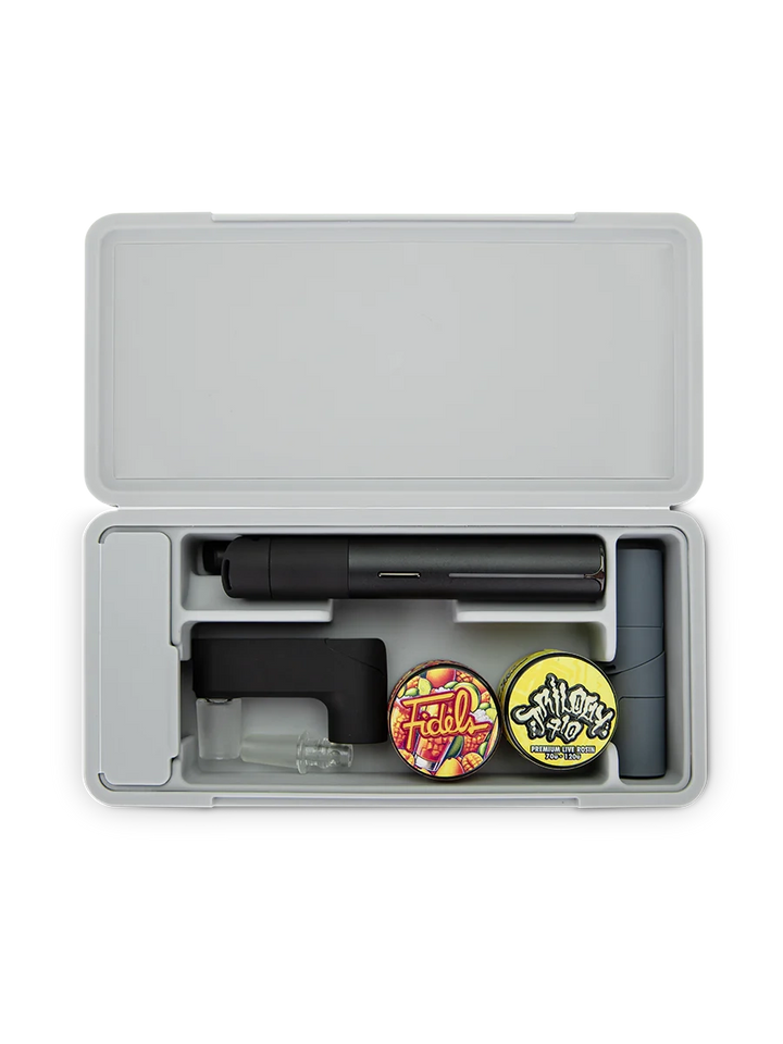 Puffco Travel Case Pearl – case open holding Puffco Pivot, Hot Knife, and jars in molded compartments.