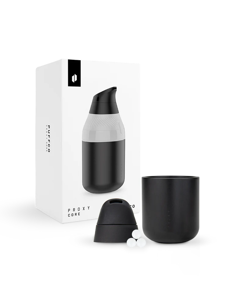 Puffco Proxy Core kit with retail packaging showing full accessory set and included components