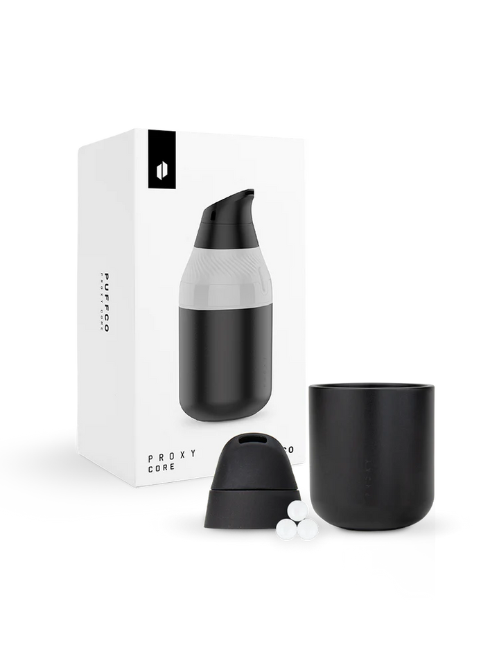 Puffco Proxy Core kit with retail packaging showing full accessory set and included components