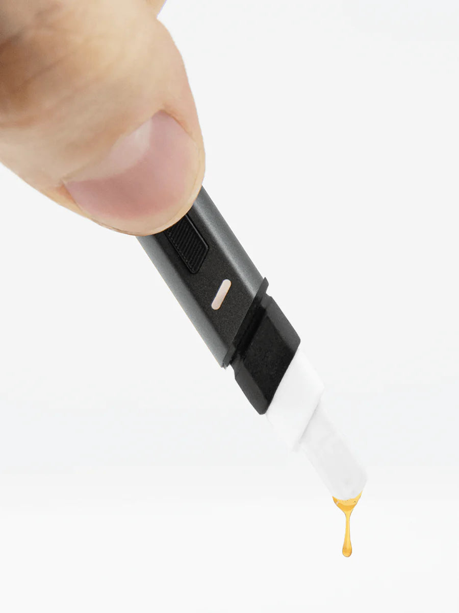 Puffco Hot Knife in use melting concentrate directly into chamber for clean loading