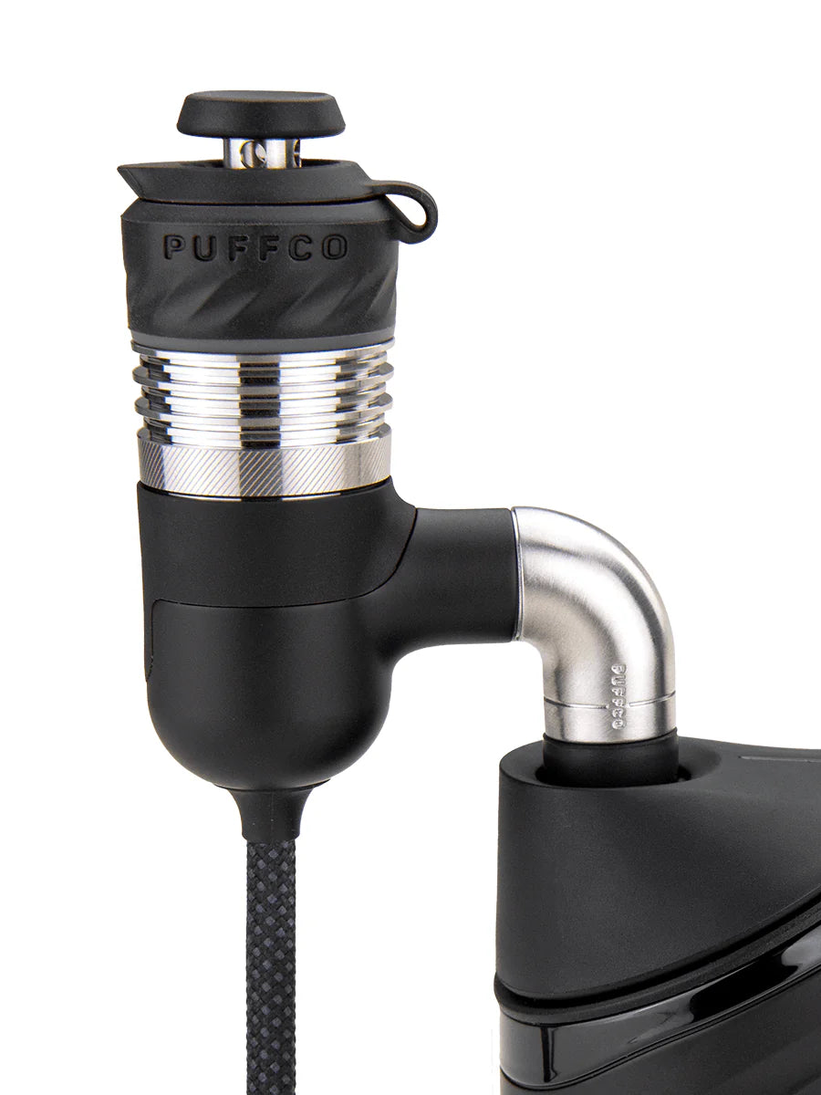 Puffco Peak Pro Link 3D chamber installed on angled glass joint adapter for precise temperature control