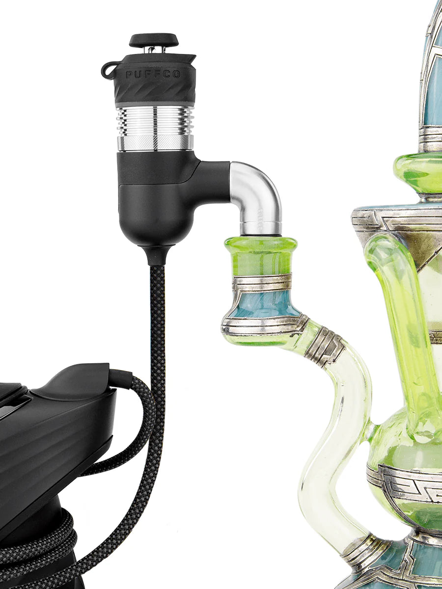 Puffco Peak Pro Link connected to glass water pipe rig showing smart e-rig conversion setup