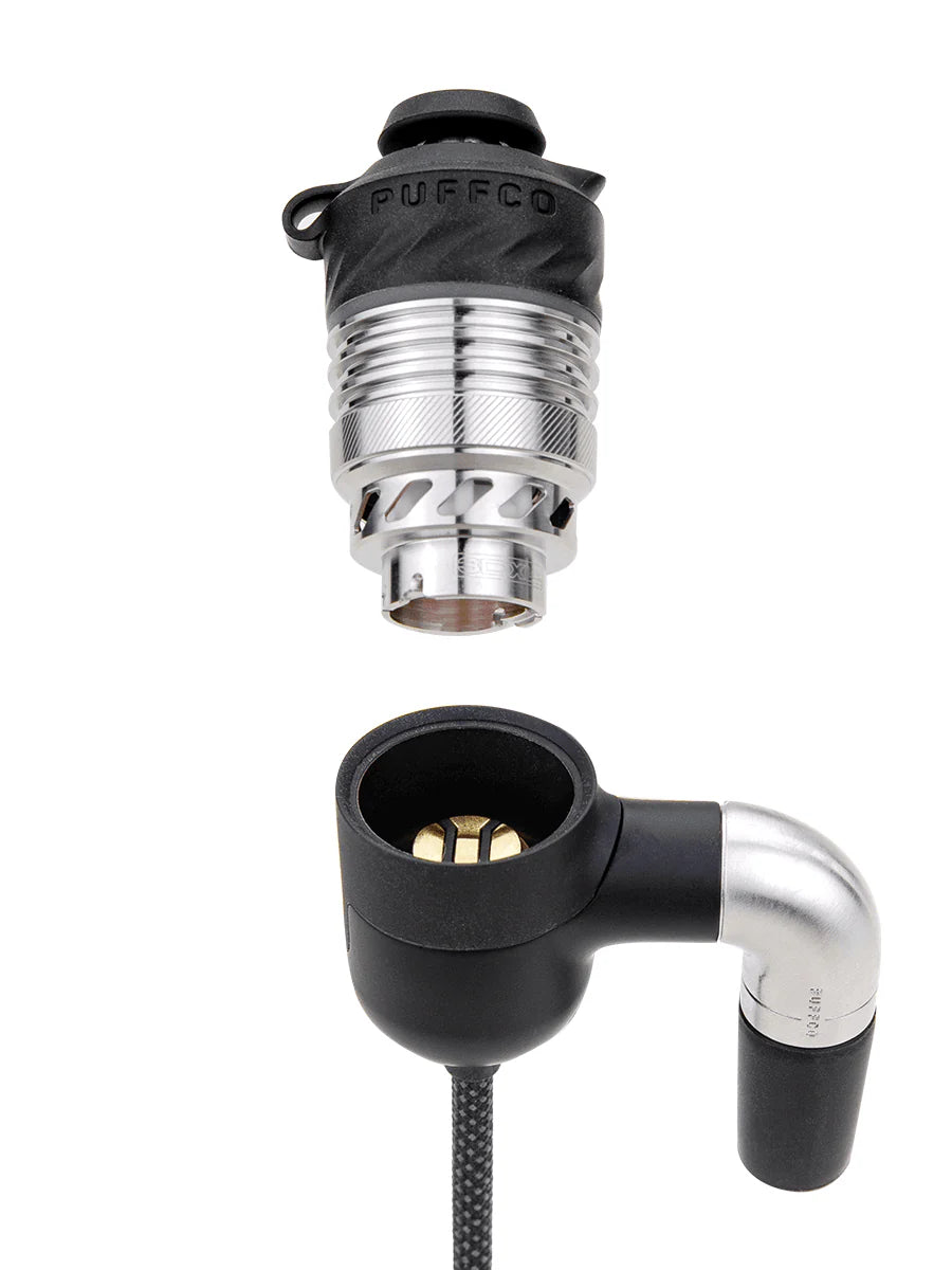 Puffco Peak Pro Link close-up of 3D chamber housing and 90-degree glass joint adapter for traditional rigs