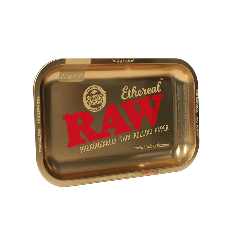 RAW Small Rolling Tray – Ethereal gold edition standing upright, smooth flat surface and RAW logo.