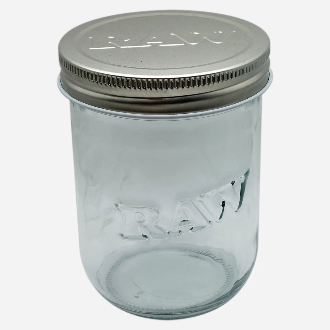 RAW Smell Proof Cozy and Jar 16 oz clear glass jar with embossed RAW logo and metal screw-on lid for airtight storage.