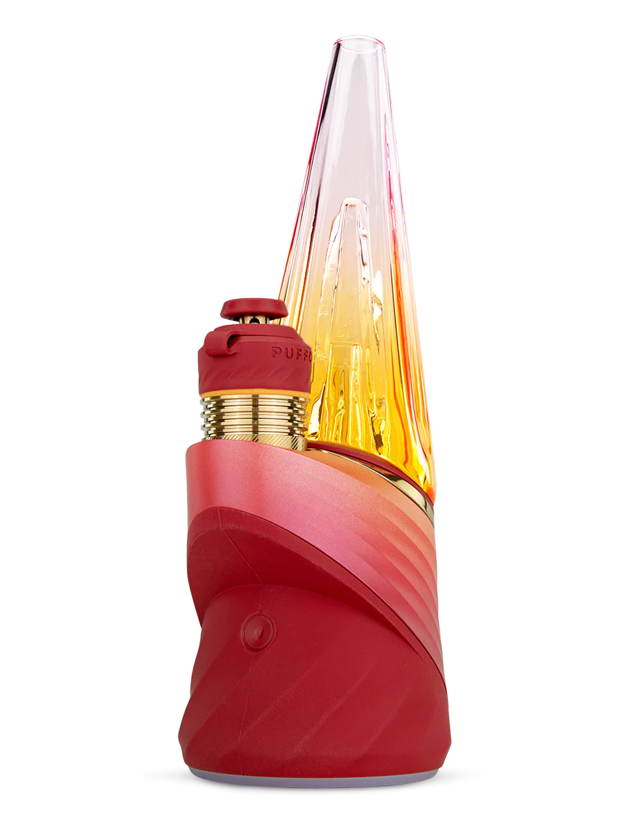 Puffco Peak Pro 3DXL in Daybreak – red base with gold 3DXL chamber and clear cone glass, angled front view.