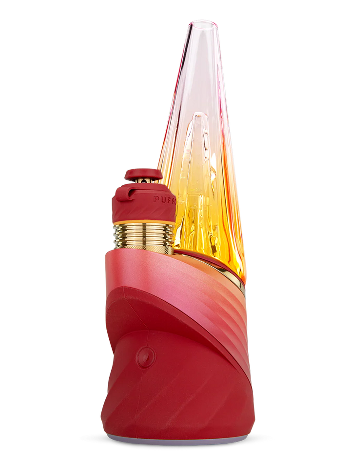 Puffco Peak Pro 3DXL in Daybreak – red base with gold 3DXL chamber and clear cone glass, angled front view.
