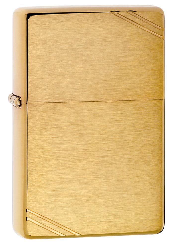 Zippo Brass Vintage lighter with brushed brass finish and diagonal slashes on corners. Windproof and refillable, ideal for collectors or gifting.