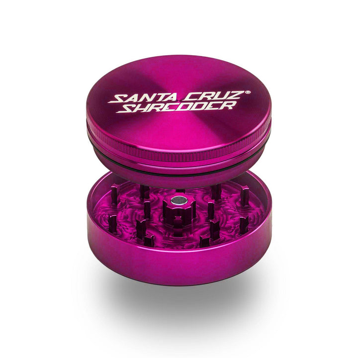 Pink Santa Cruz Shredder 2-Piece Large Grinder – precision-milled teeth and magnetic lid shown open.