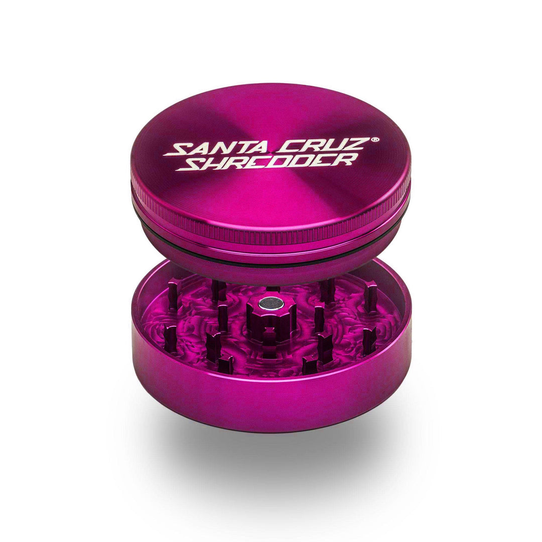 Pink Santa Cruz Shredder 2-Piece Large Grinder – precision-milled teeth and magnetic lid shown open.