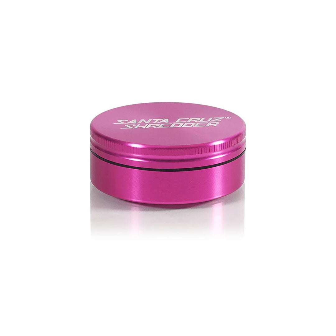 Santa Cruz Shredder Medium 2-Piece Grinder in Pink – magnetic lid and precision-cut construction.